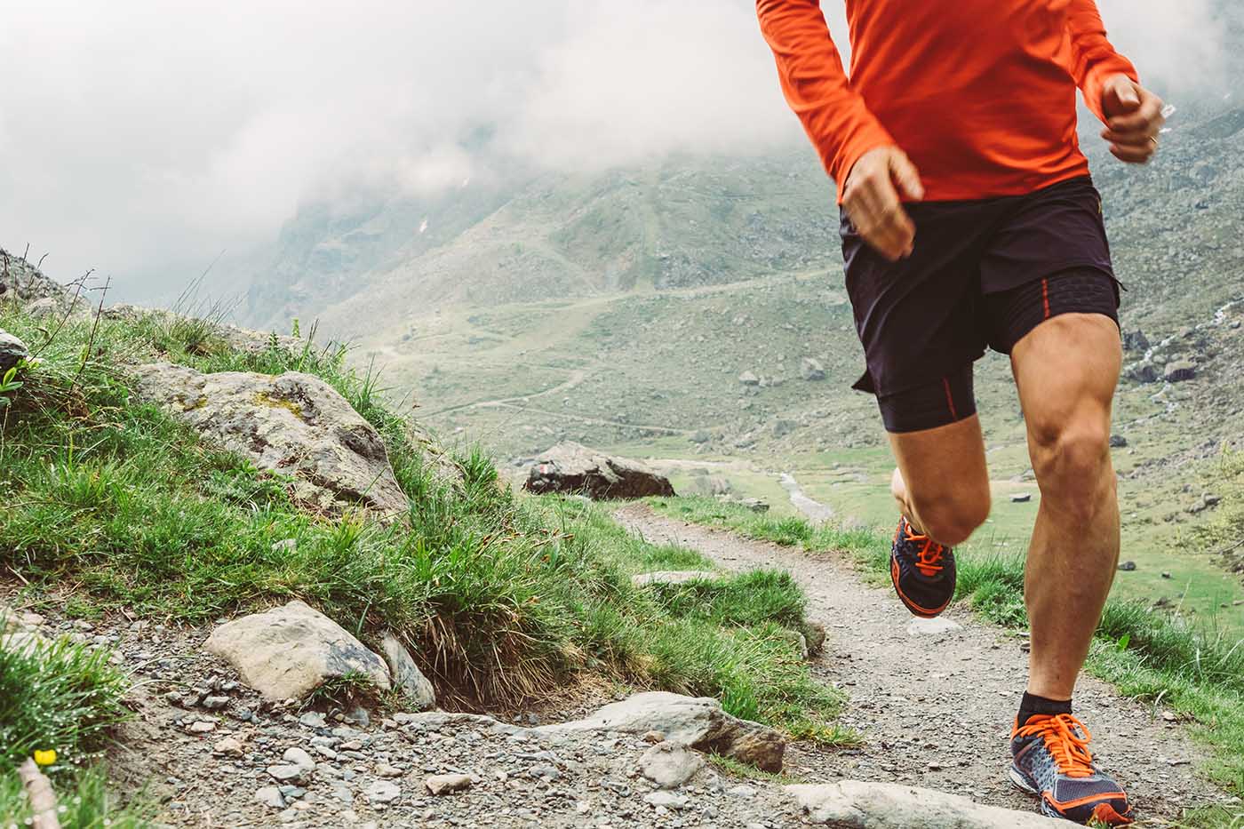 Outdoor trail athlete training in mountains